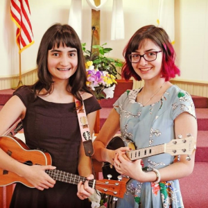 ^Natalie Harmon (right) with sister Marenna Harmon