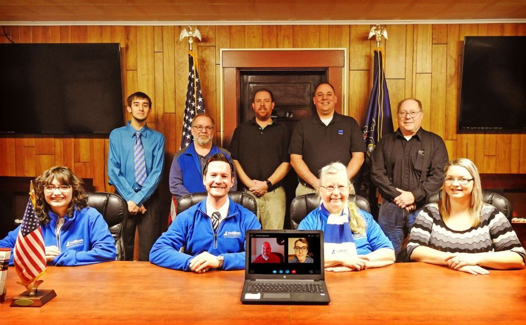 TECHREADY TEAM: Back row from left to right: Brad Bowser, Michael Shaw (Shaw Aerial Photography & Videography), Nick Horner, Sean Bowser, John Gerow. Front row from left to right: Cecelia Harmon, Gordon Barrows, Monica Barrows, Brandy Brinker (Brinker Digital Consulting). Front laptop from left to right via Skype: Tim Dixon, Matt Green